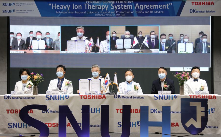 DK메디칼솔루션과 도시바가 참여한 컨소시엄은 서울대병원과 부산 기장군에 소재한 중입자치료센터에 구축될 암 치료용 '중입자 치료기' 도입계약을 8월 31일 체결했다.